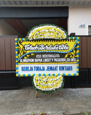 Papan Bunga Duka di Hantara